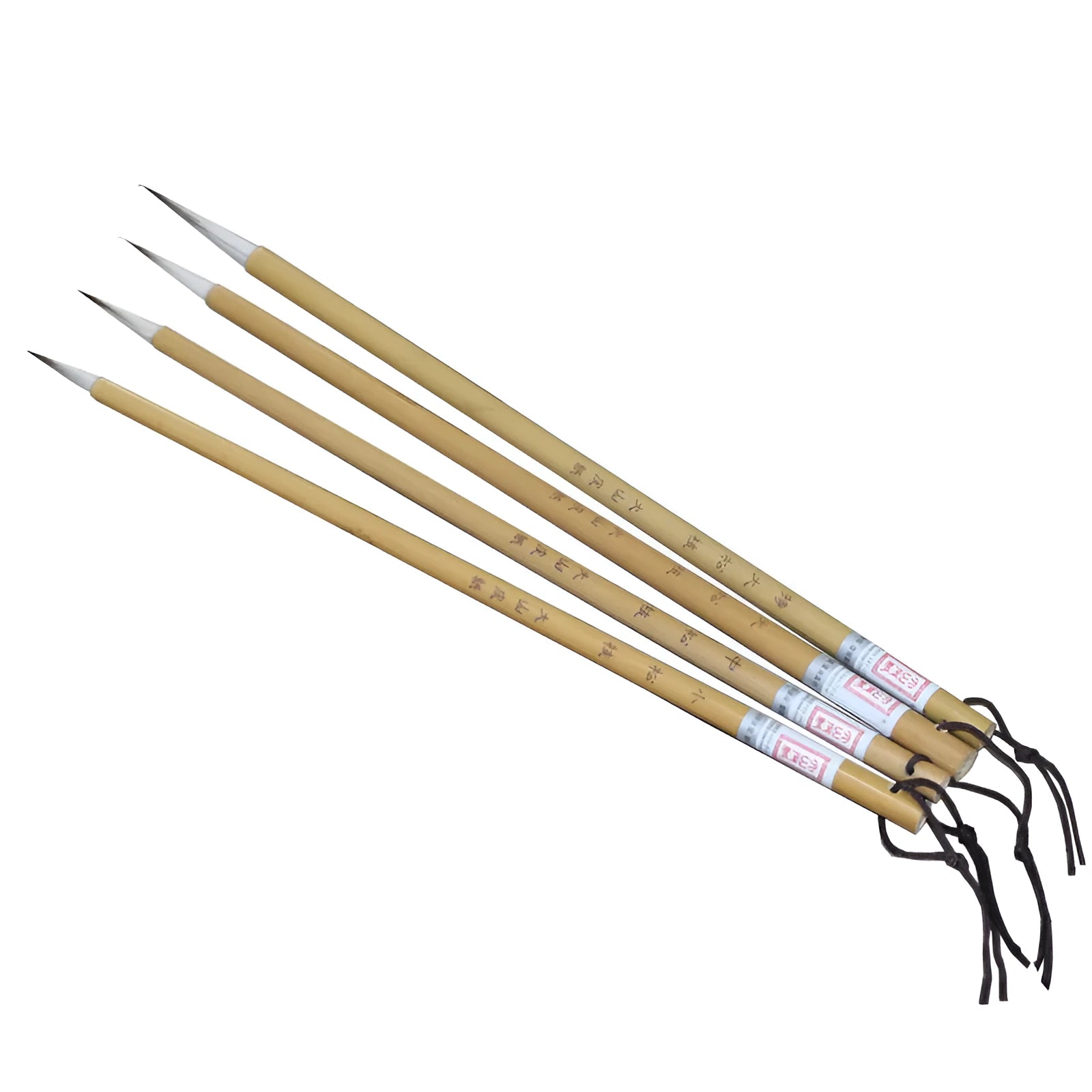 Set of four gold-coloured writing brushes with mixed hair bristles for calligraphy.