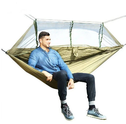 Parachute hammock with mosquito net in various colors and sizes, ideal for outdoor adventures and relaxation