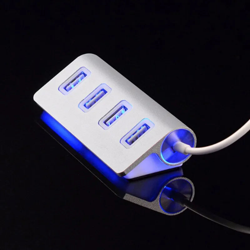 Silver USB-C to 4-port USB 2.0 hub with aluminium alloy build, compact size 88x39x22 mm