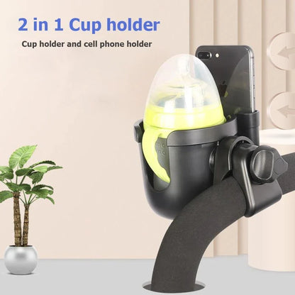 Universal baby stroller cup holder with phone pocket attached to a stroller