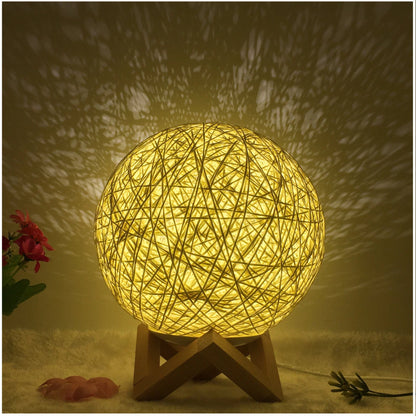 LED rattan table lamp with hand-knit lampshade in various colours
