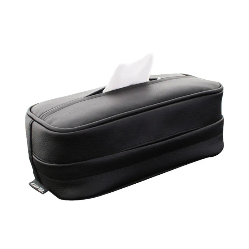 Black PU leather hanging storage box with paper bag design, shown suspended.