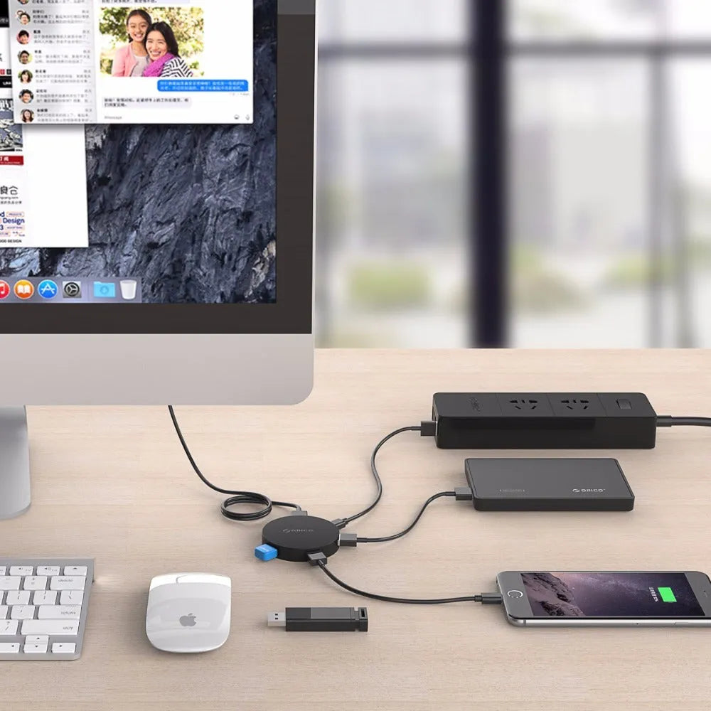 ORICO HA4U-U3 USB 3.0 four port hub in black ABS with four USB Type-A ports and Micro USB input
