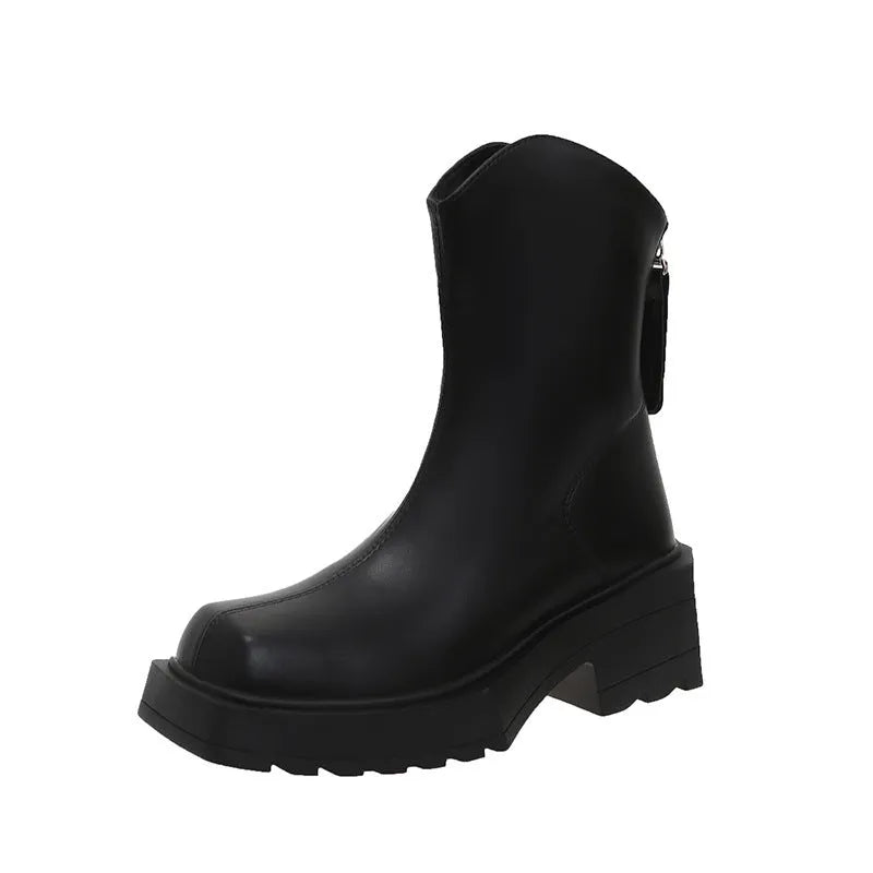 Women's black platform Martin boots with square toe and back zipper, showing 6-8cm heel