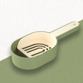 Self-cleaning cat litter scoop in blue, made from ABS material, with shovel shape for scooping clumps