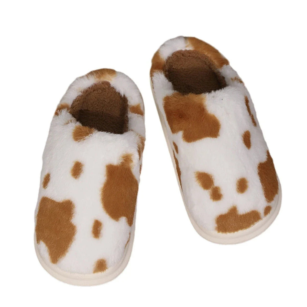 A pair of cozy, plush slippers with a unique spotted pattern, designed for warm and comfortable indoor wear.