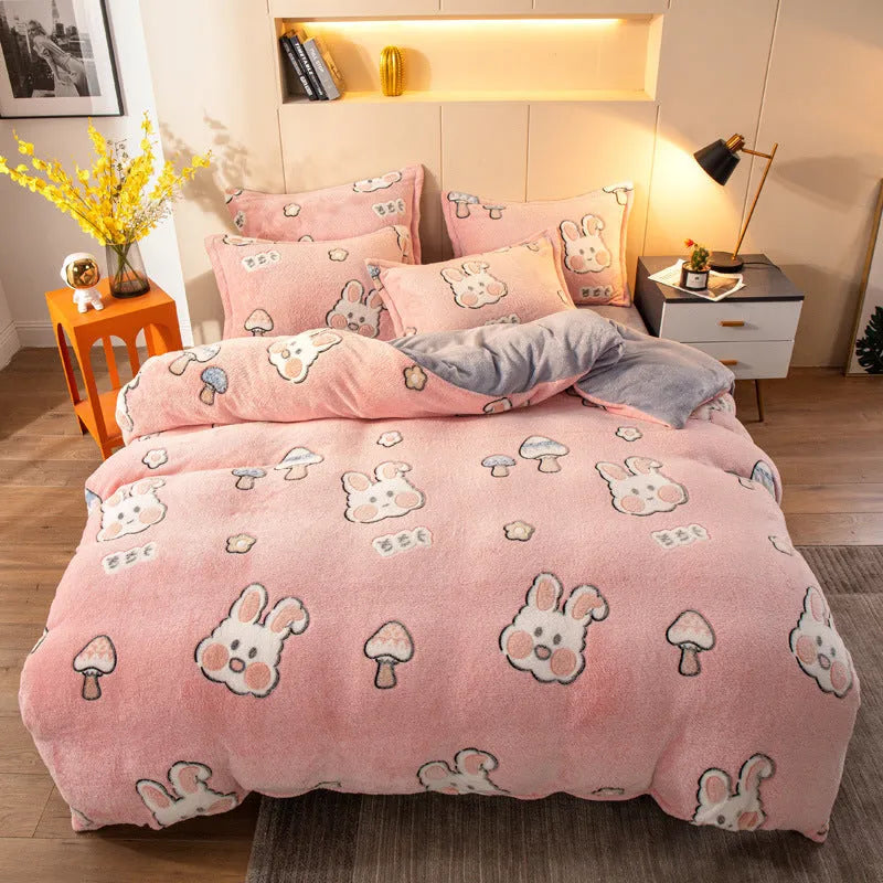 Four-piece milk velvet bedding set with quilt cover, bed sheet, and pillowcases in warm colour