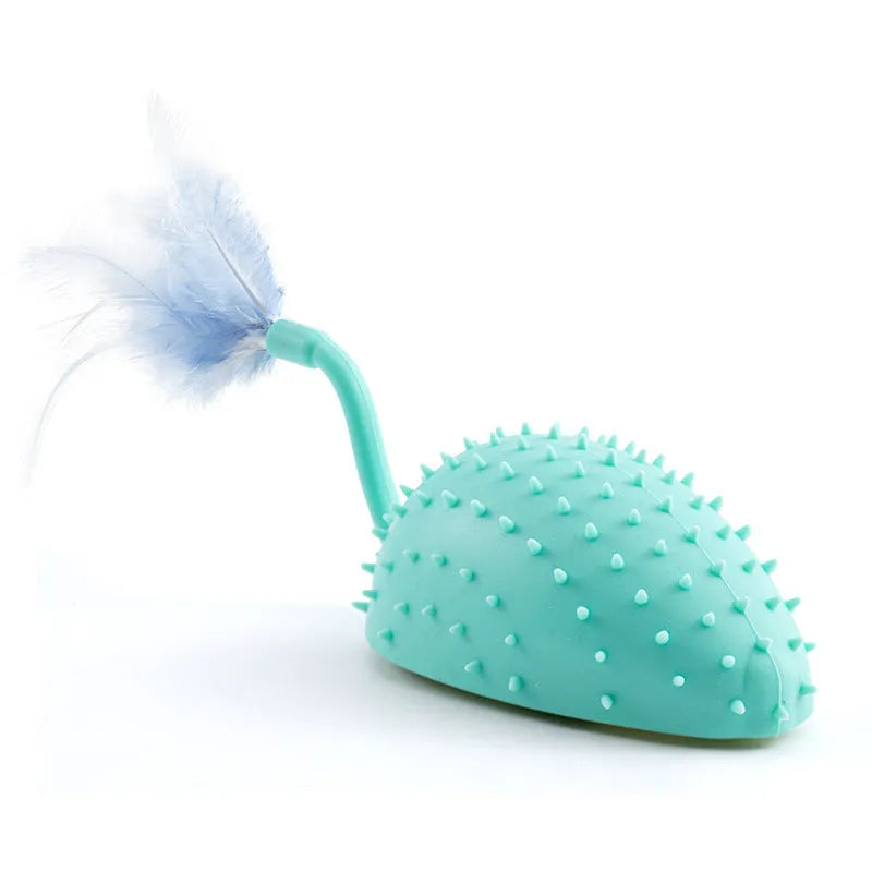 Remote control and USB-rechargeable silicone mouse cat toy in cyan colour with attached feathers.