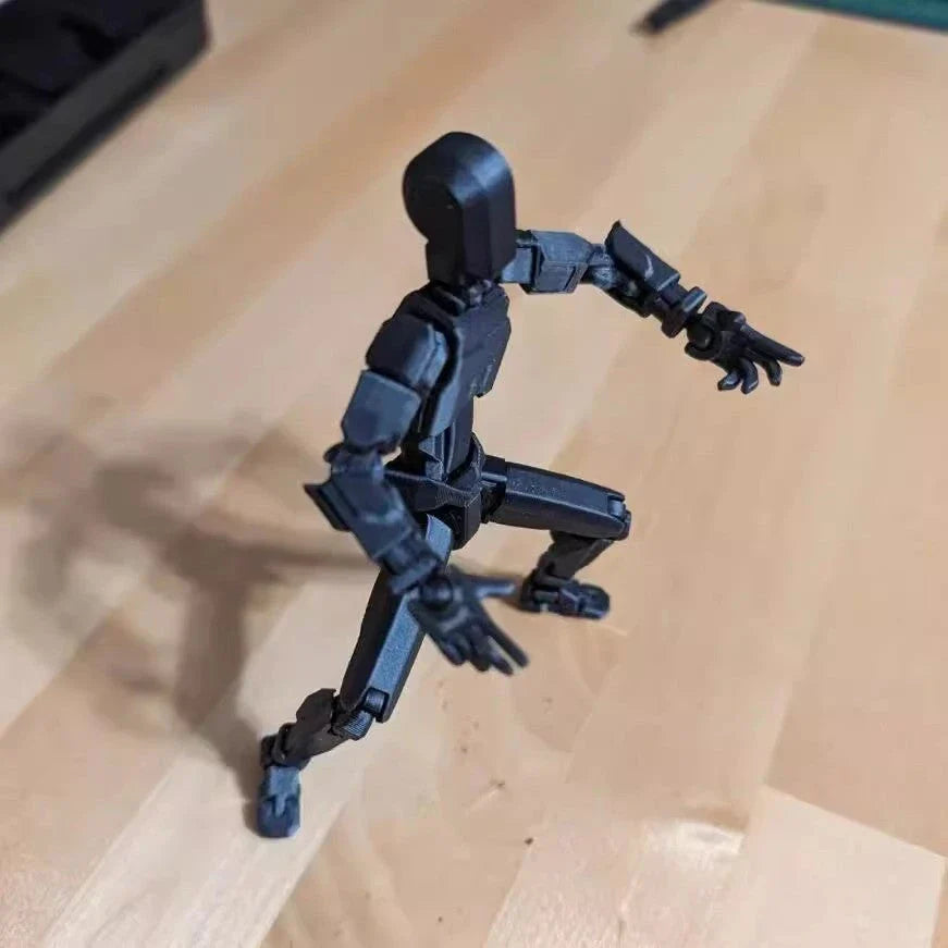 Customizable 3D printed robot mannequin with posable joints for creative expression, illustration, desk decor, and unique gifting.