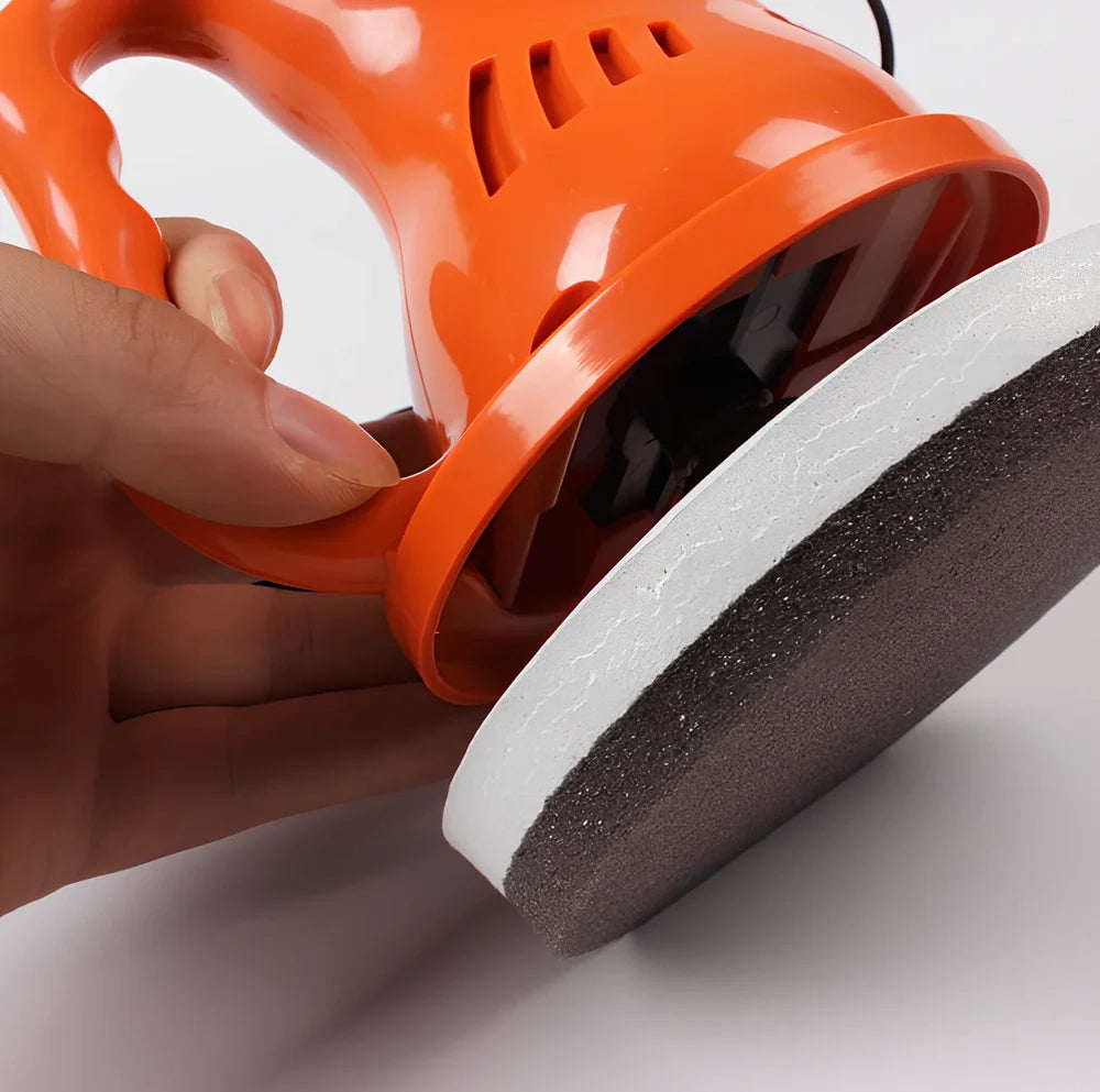 12V car polishing machine with integrated handle in black or orange colour options