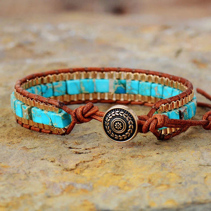 Hand-woven leather bracelet with blue imperial stone accent, geometric design