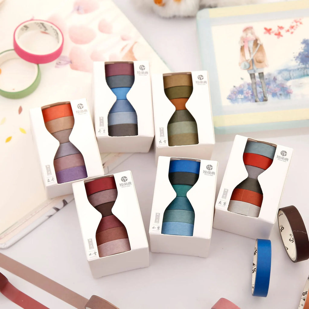 Morandi Japanese paper tape six rolls 9mm x 3m in assorted colours on craft background
