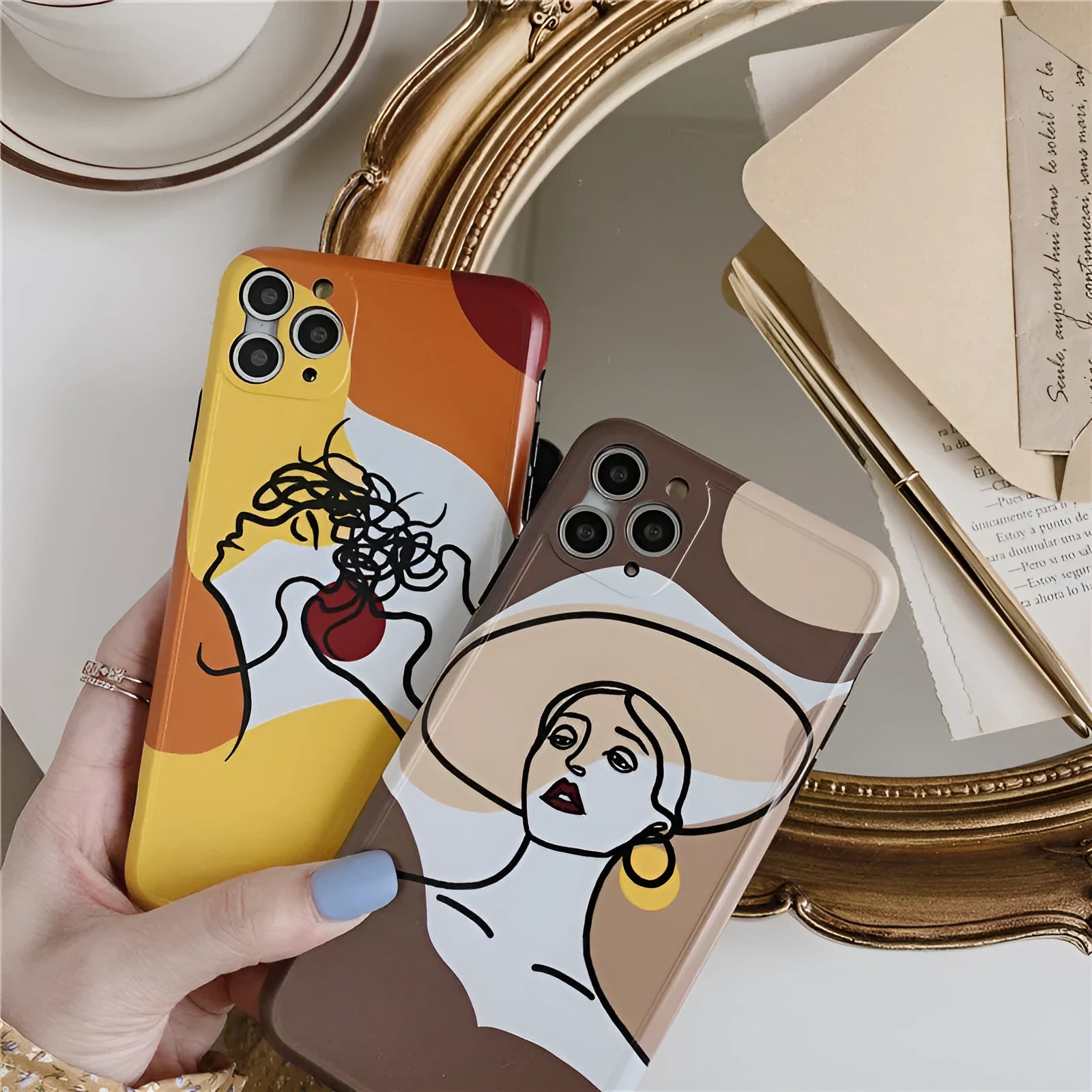 Orange yellow soft silicone iPhone case with a hand-drawn cartoon line painting design.