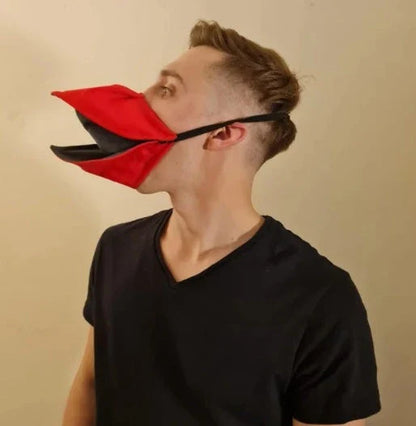 Handcrafted duck design face cover in absorbent cotton, available in black, red, and yellow
