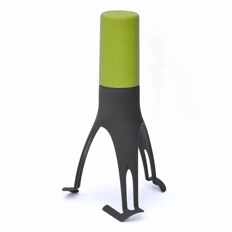 Green Uutensil Stirr automatic cooking mixer device for stirring sauces and soups.