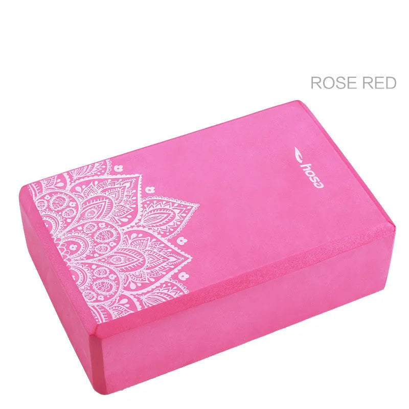 Eco-friendly EVA yoga brick in blue colour with measurements 23cm x 15cm x 7.5cm on a flat surface
