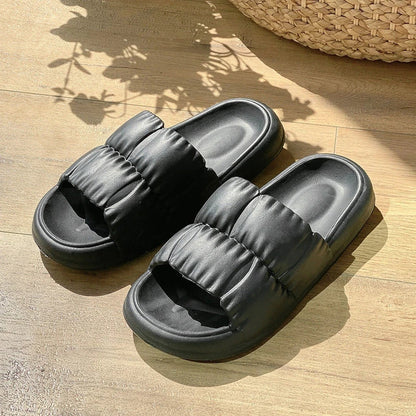 Plush Bathroom Slides in various colors and designs, featuring a soft, comfortable EVA sole and breathable upper material.