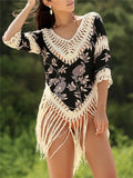 Women's apricot V-neck sun protection blouse with long hollow-out sleeves on a mannequin.