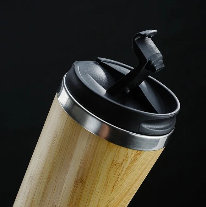 Bamboo coffee cup with double wall insulation, leak-proof lid, and anti-slip foam pad base