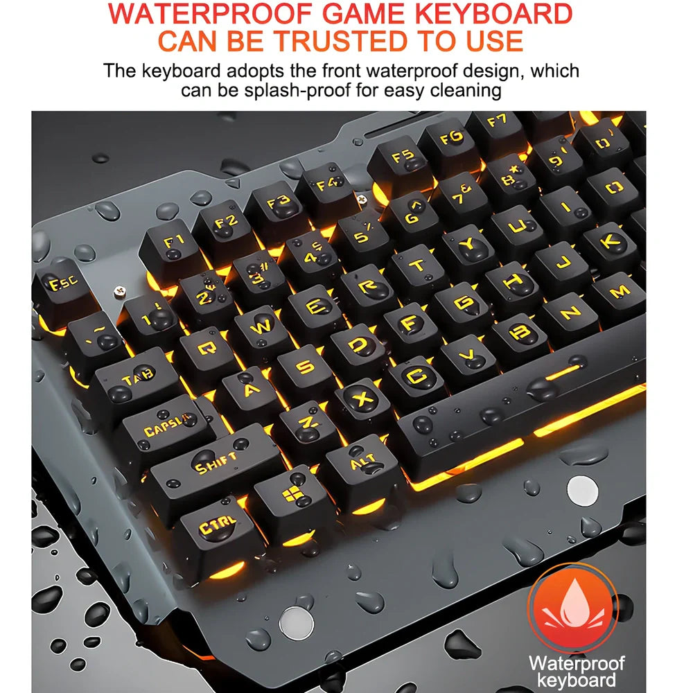 Black wired gaming keyboard with RGB backlight, phone holder, and magnetic wrist rest on desk