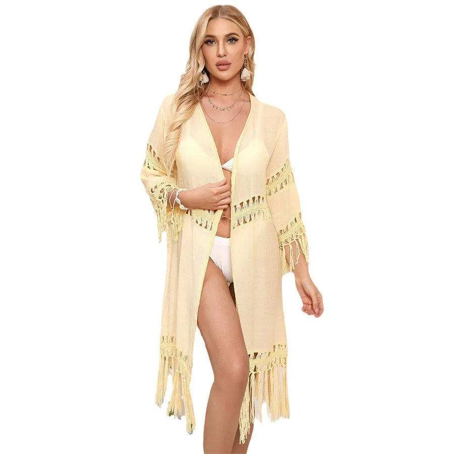 Hand-crocheted women's beach cover-up cardigan with tassel trim in acrylic fabric