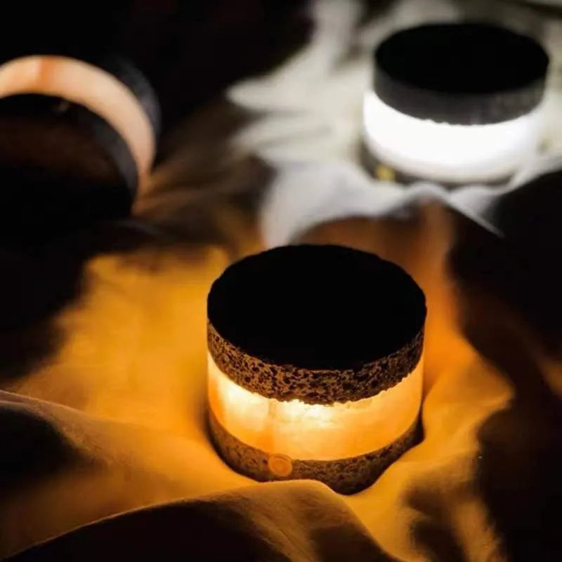 Small orange volcanic rock USB night lamp with warm light, shown next to a USB cable
