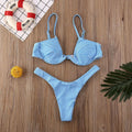 Women's spandex bikini set in black, blue, and leopard print variants, sizes S to XL