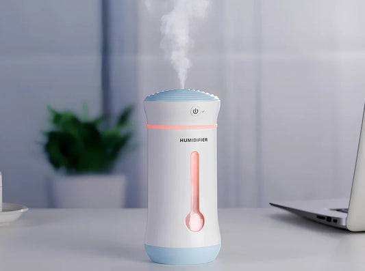 Creative car air purifier humidifier in pink, 7.6x7.6x17cm size with 300ml bottle and USB cable