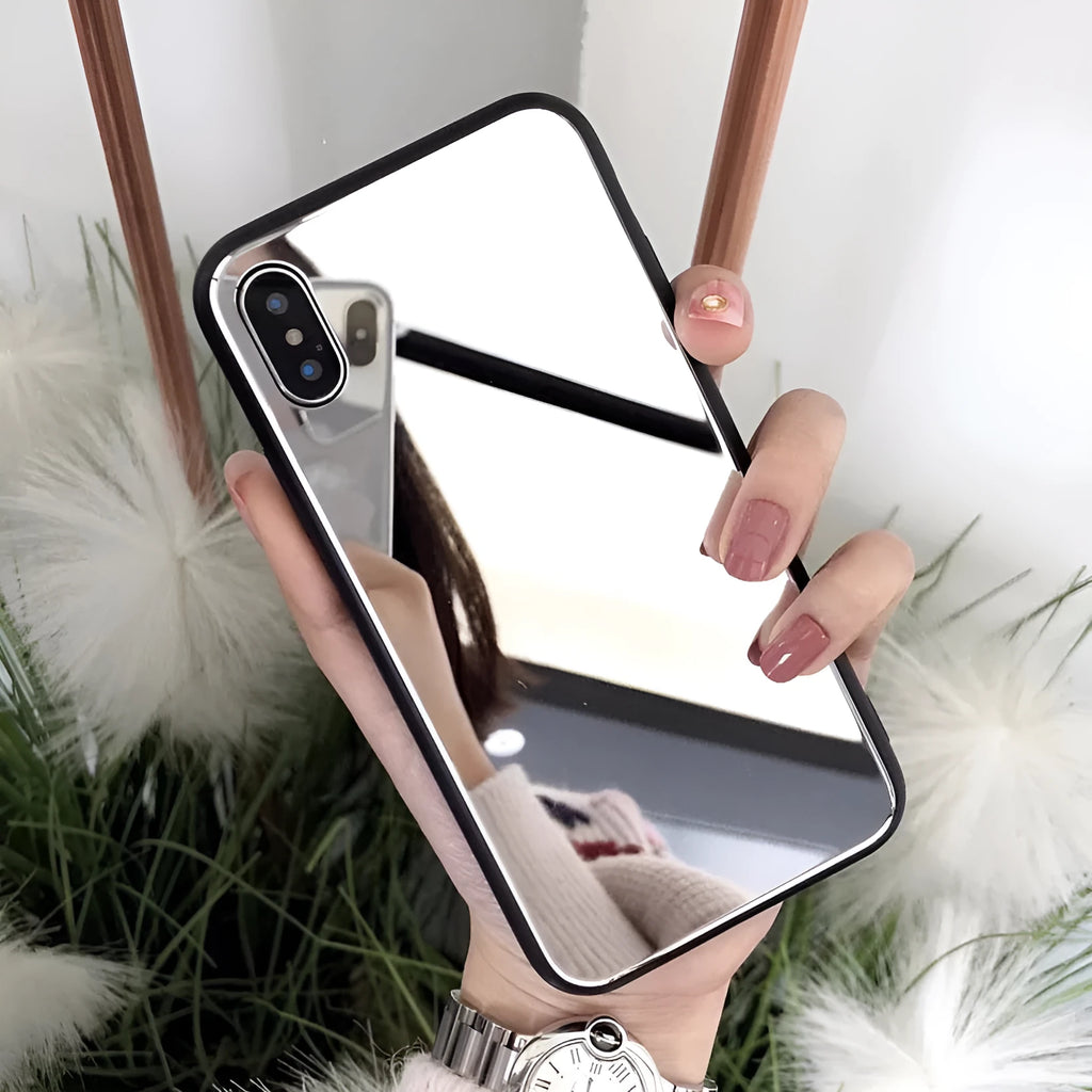 Black iPhone mirror phone case with reflective back cover for iPhone X and other models.