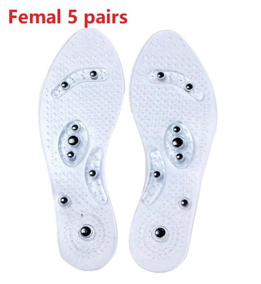 Transparent magnetic massage insole with silicone elastomer, visible magnets and massage nubs, on white background