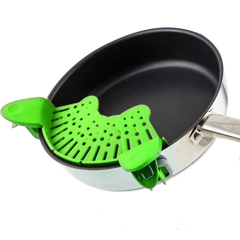 Universal Silicone Clip-on Pan Pot Strainer in purple and green, showcasing its compact design and secure clips