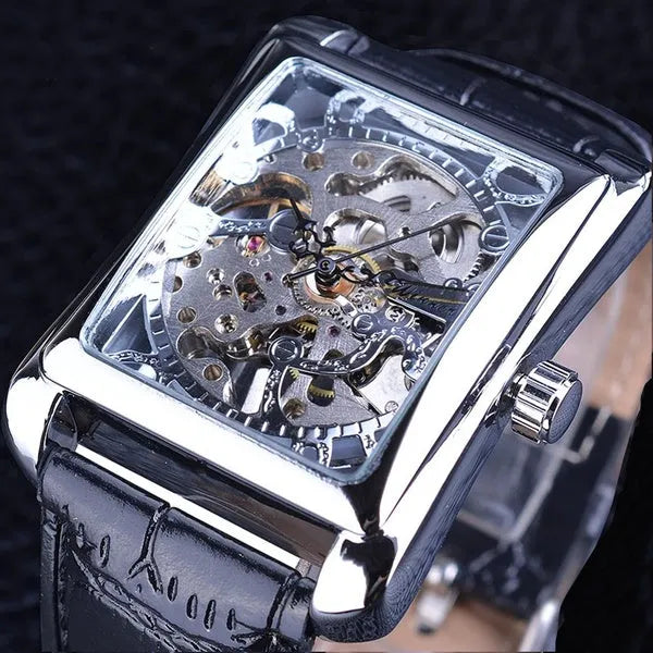 Winner men's Swiss hollow manual mechanical watch with rectangular alloy case and leather strap on white background