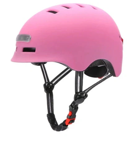 Black cycling helmet with built-in LED headlight and taillight showing adjustable dial and ventilation ports