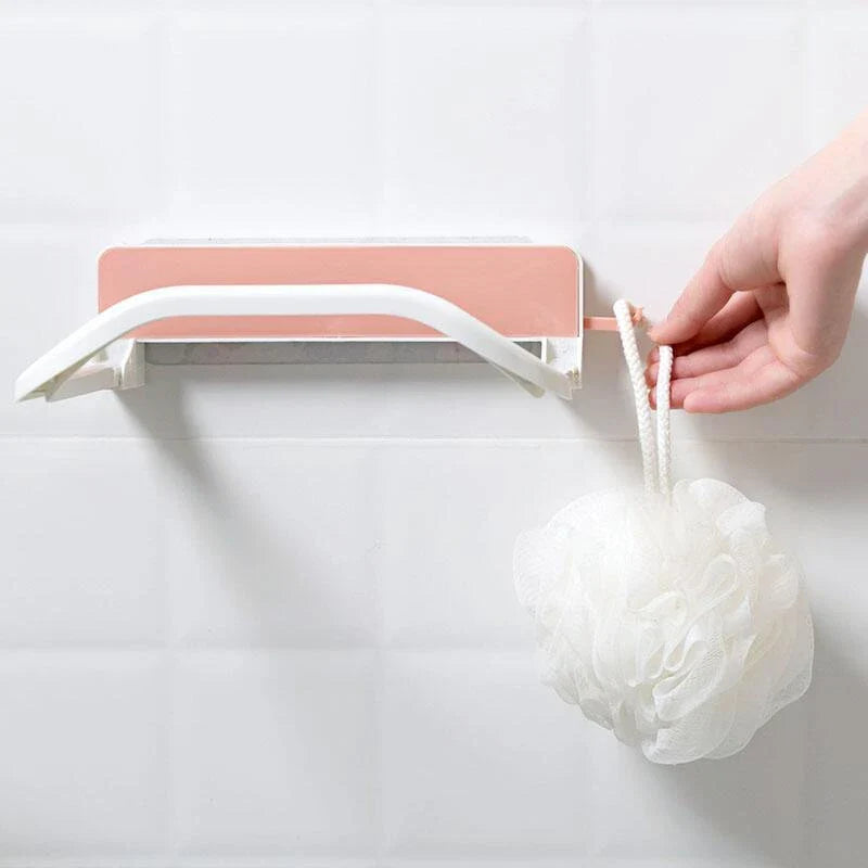 Folding storage rack with non-marking stickers in pink, blue, and grey