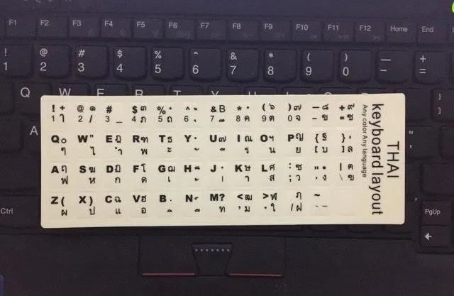 Yellow PVC keyboard stickers with glowing multilingual characters for desktop and laptop computers