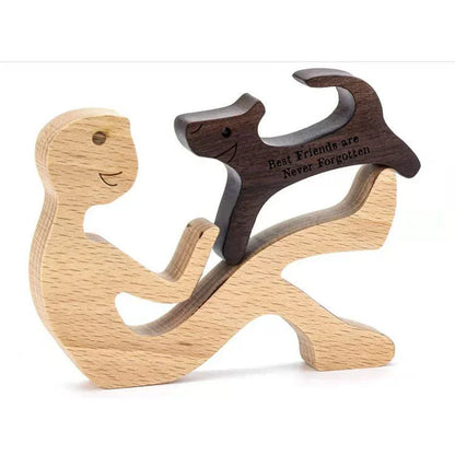 Handcrafted wooden dog sculpture featuring a man and his loyal canine companion