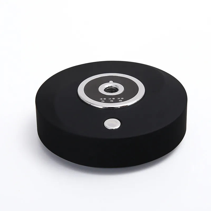 Black, grey, and white USB-charged car air freshener with 31-60 day scent duration on anti-slip pad.
