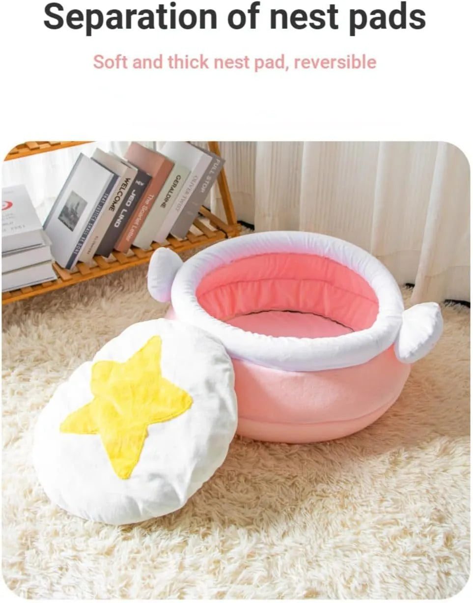 Pink honey pot-shaped cat sofa bed with a magic wand, showing a removable cushion inside.