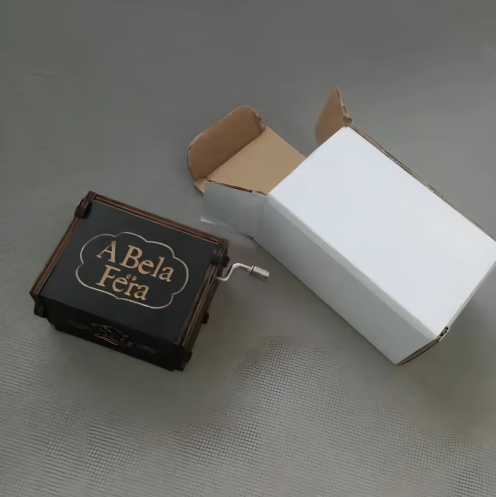 Antique boxwood music box with hand crank and yin carved Spirited Away landscape flowers, 10 cm tall wooden decoration