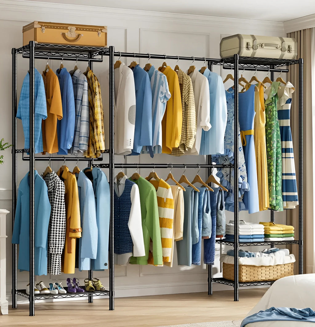 Black metal clothing storage rack measuring 175cm high with hangers and trousers organised