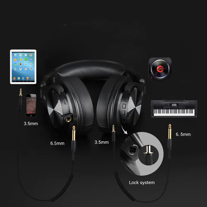 Head-mounted wireless Bluetooth monitor headset in black with 40mm speaker and coiled audio cable