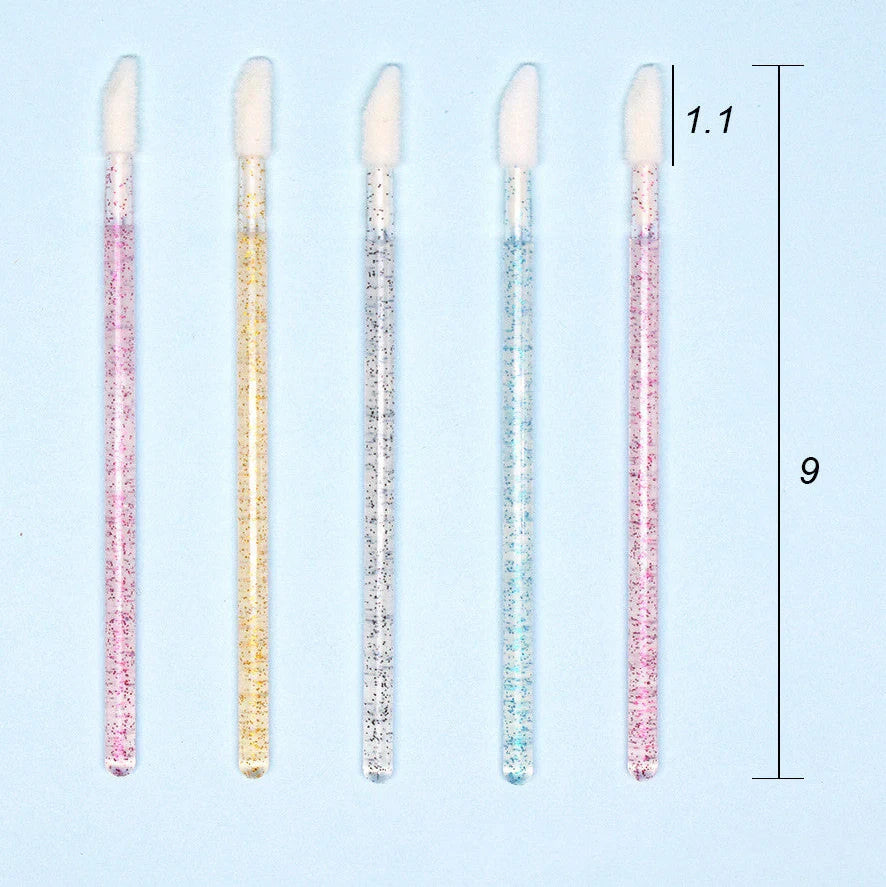 Crystal rod lip brush with synthetic fibre bristles in six colour options on white background