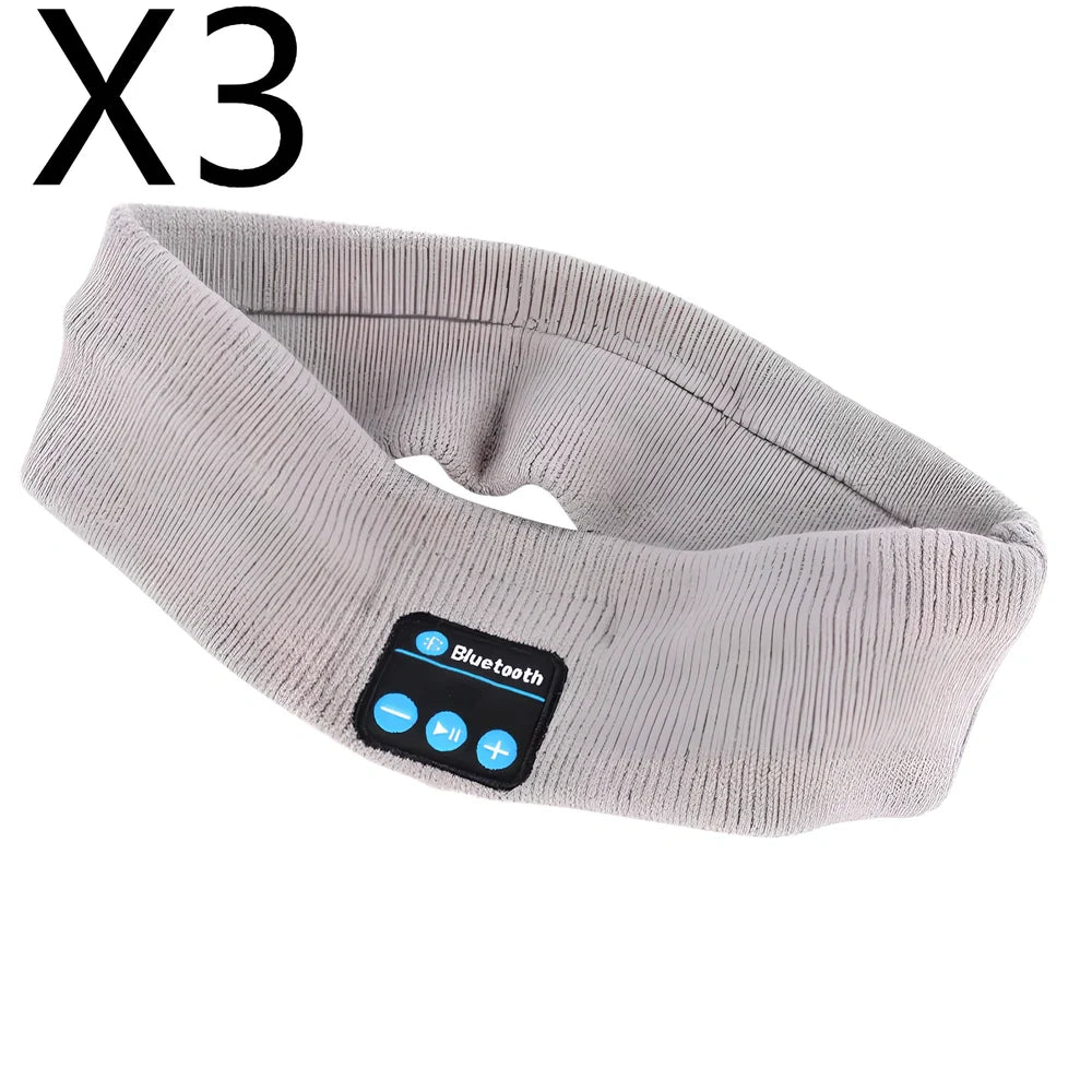 Black Bluetooth sports headband with integrated audio controls and 110mAh battery for workouts