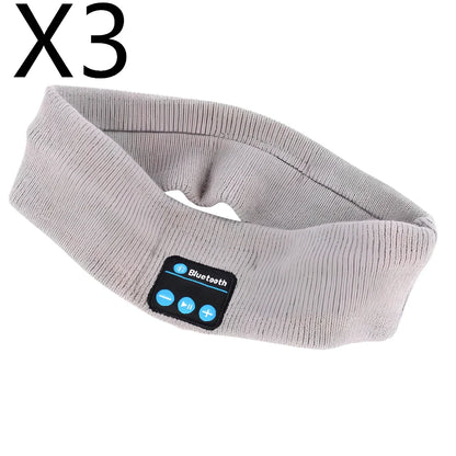 Black Bluetooth sports headband with integrated audio controls and 110mAh battery for workouts