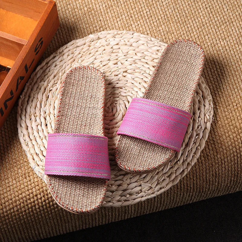 Linen open-toe home slippers with EVA sole in woven blue colour on a light background
