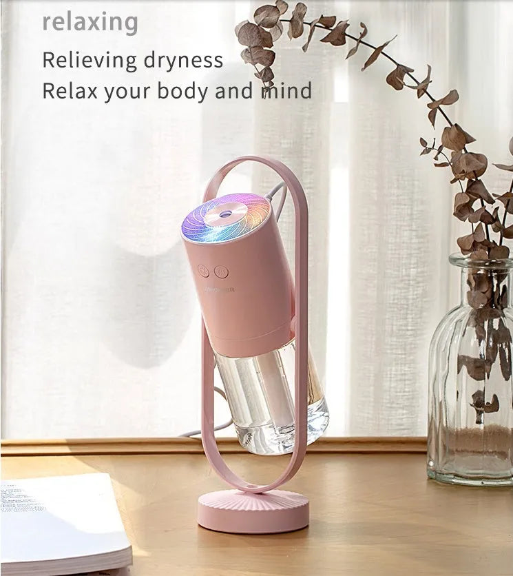 USB air humidifier with projection night light in pink, 200ml water tank, ultrasonic mist maker for car and home use