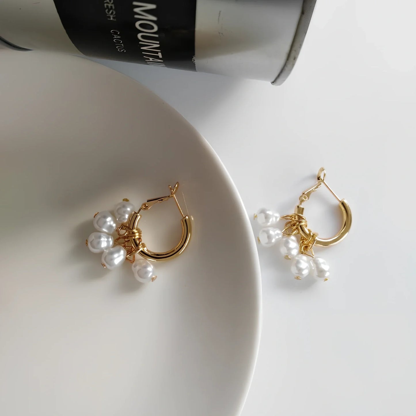 Women's gold pearl tassel earrings with geometric alloy design and electroplated finish, simple drop style for events