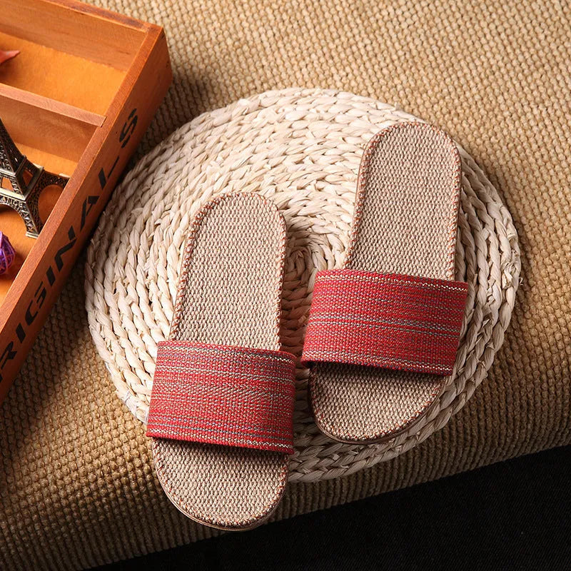 Linen open-toe home slippers with EVA sole in woven blue colour on a light background
