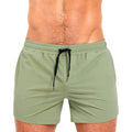 Polyester sports shorts with mesh lining in multiple colours including army green and rose red.