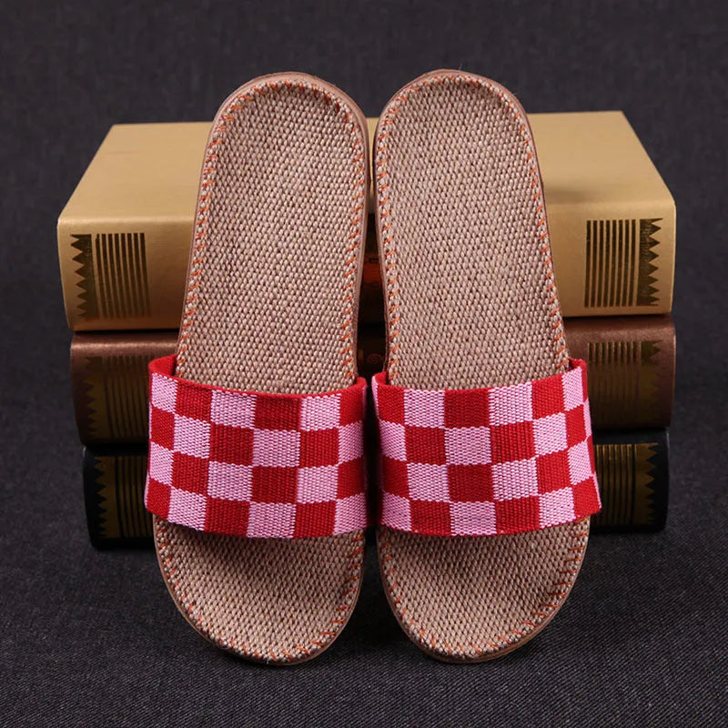 Linen open-toe home slippers with EVA sole in woven blue colour on a light background